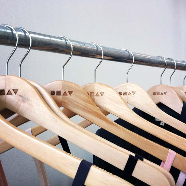 chay-clothes-hangers CHAY branded clothing hangers — retail identity design, LA boutique